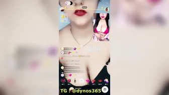 Busty Camgirl Stripping Topless Showing Huge Tits On Video