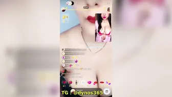 Busty Camgirl Stripping Topless Showing Huge Tits On Video