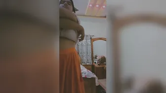 Chubby GF Undressing Showing Off Her Massive Tits