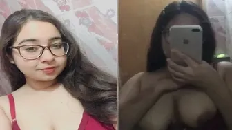 Topless GF Admiring Her Huge Tits In Bedroom Mirror