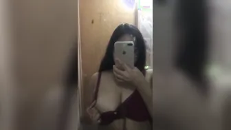 Topless GF Admiring Her Huge Tits In Bedroom Mirror