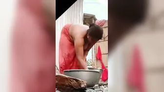 Desi Bhabhi Showing Off Her Hanging Tits While Bathing At Home