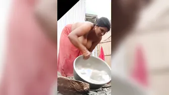 Desi Bhabhi Showing Off Her Hanging Tits While Bathing At Home