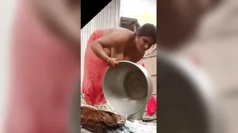Desi Bhabhi Showing Off Her Hanging Tits While Bathing At Home