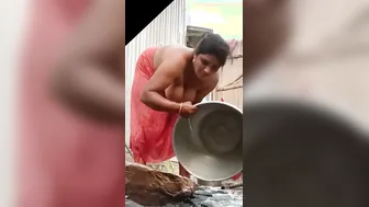 Desi Bhabhi Showing Off Her Hanging Tits While Bathing At Home