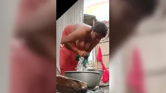 Desi Bhabhi Showing Off Her Hanging Tits While Bathing At Home
