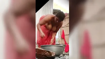 Desi Bhabhi Showing Off Her Hanging Tits While Bathing At Home