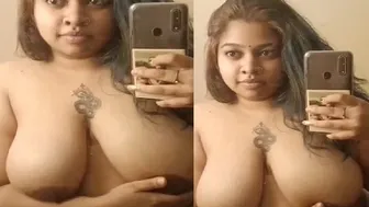 Chubby GF Taking Topless Selfie Showing Her Big Tankers