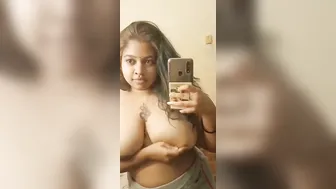 Chubby GF Taking Topless Selfie Showing Her Big Tankers