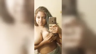 Chubby GF Taking Topless Selfie Showing Her Big Tankers