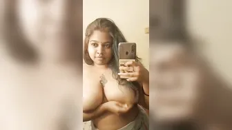 Chubby GF Taking Topless Selfie Showing Her Big Tankers