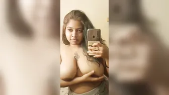 Chubby GF Taking Topless Selfie Showing Her Big Tankers