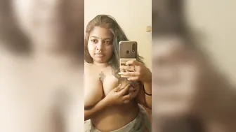 Chubby GF Taking Topless Selfie Showing Her Big Tankers