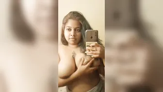 Chubby GF Taking Topless Selfie Showing Her Big Tankers