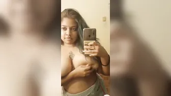 Chubby GF Taking Topless Selfie Showing Her Big Tankers