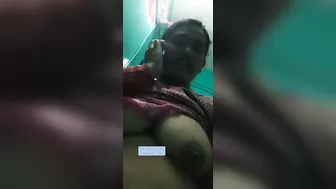 Bhabhi Goes Topless Answering Phone Call Caught On Video