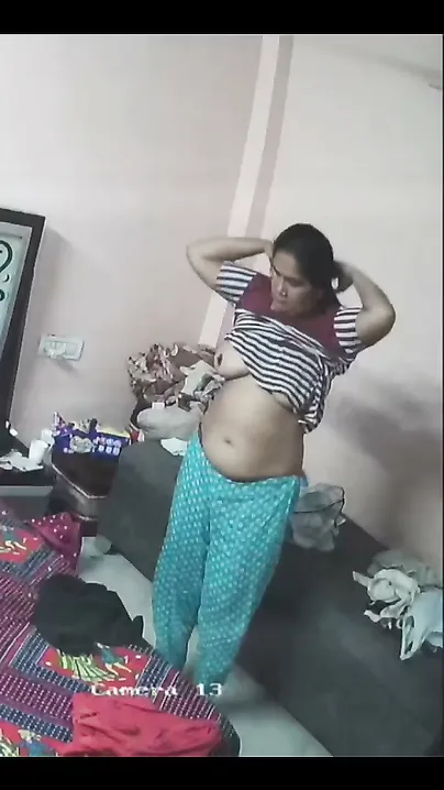 Mature Aunty Changing Clothes Caught On Camera Undressing Nude