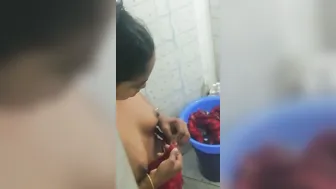 Hot Bhabhi Showing Big Boobs In Bathroom Before Taking Shower