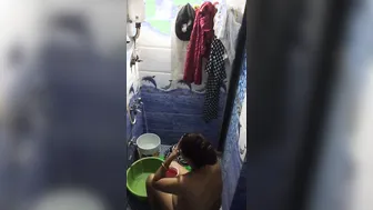 Sexy Bhabhi Bathing Caught By Neighbor Filming Her Secretly