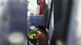 Sexy Bhabhi Bathing Caught By Neighbor Filming Her Secretly