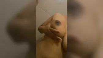 GF Stripping Topless And Fondling Her Big Tits Playfully