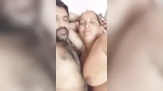 Mature Aunty Hugging Topless Showing Her Massive Boobs Online