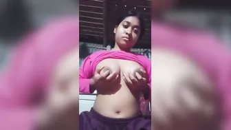 Village Babe Squeezing Her Big Natural Breasts In Topless Tease