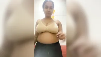 Busty GF Stripping Off Her Bra Revealing Tits