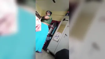 Granny Flashing Her Saggy Tits While Getting Dressed