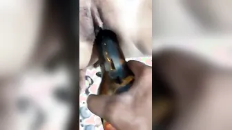 Stuffing A Beer Bottle Deep Inside Her Wet Pussy