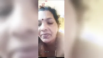 Mature Woman Playing With Her Massive Natural Tits