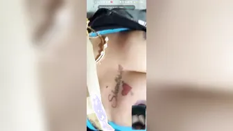 Tattooed Slut Showing Off Her Big Nipples On Camera