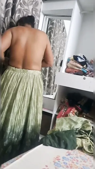 Indian Milf Changing Clothes Caught On Hidden Camera