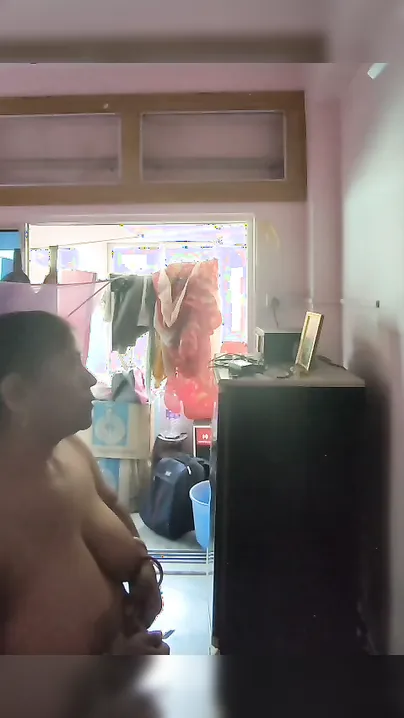 Busty Mom Strips Naked In The Living Room