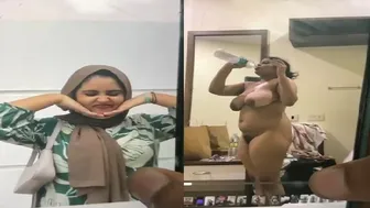 Big Titted Muslim Babe Stripping Naked For The Camera
