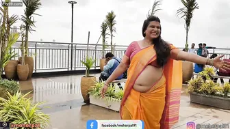 Busty Milf Shaking Her Thick Belly For Strangers At The Beach
