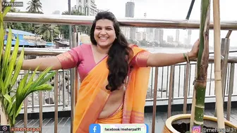 Busty Milf Shaking Her Thick Belly For Strangers At The Beach