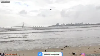 Busty Milf Shaking Her Thick Belly For Strangers At The Beach