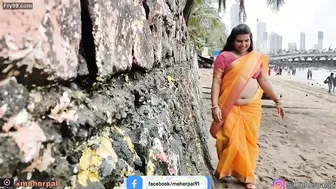 Busty Milf Shaking Her Thick Belly For Strangers At The Beach