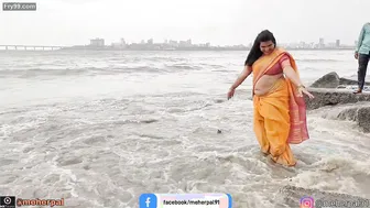 Busty Milf Shaking Her Thick Belly For Strangers At The Beach