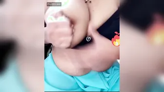 Busty Aunty Massaging Her Huge Tits For The Guy Next Door