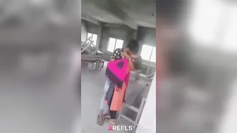 Young Desi Couple Smooching Passionately Outdoors