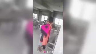 Young Desi Couple Smooching Passionately Outdoors