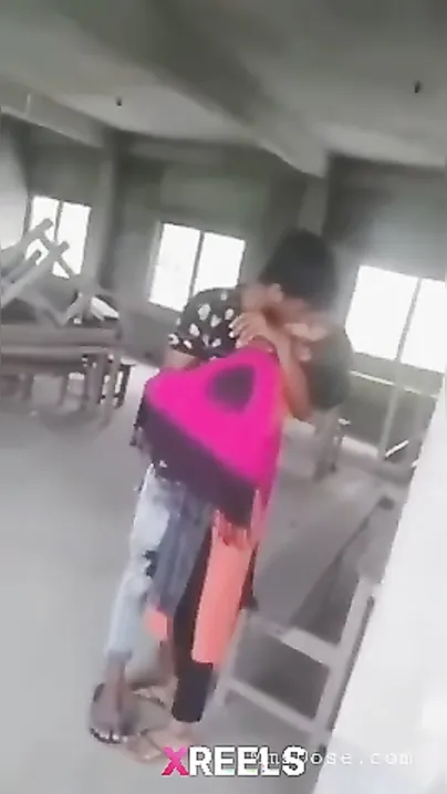 Young Desi Couple Smooching Passionately Outdoors