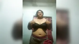 Desi Bhabhi Stripping Sari Revealing Massive Jugs In Village Hut