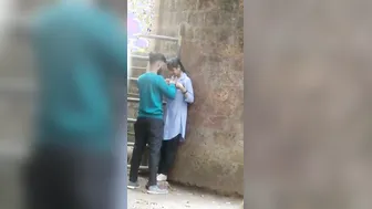 Young Lovers Romancing Passionately Caught In Village Fields