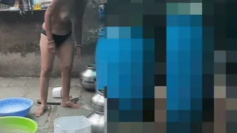 Indian Stepsister Bathing In Wet Bra Outdoors While He Watches From Behind