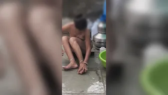Hidden Camera Catches Desi Stepsister Bathing Naked In Outdoor Bathroom Space