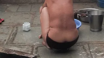 Elder Bhabhi's Sister Bathes Nude In Red Leggings At The Open Courtyard