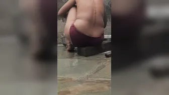 Desi Girl Bathing In Open Courtyard Wearing Red Tights